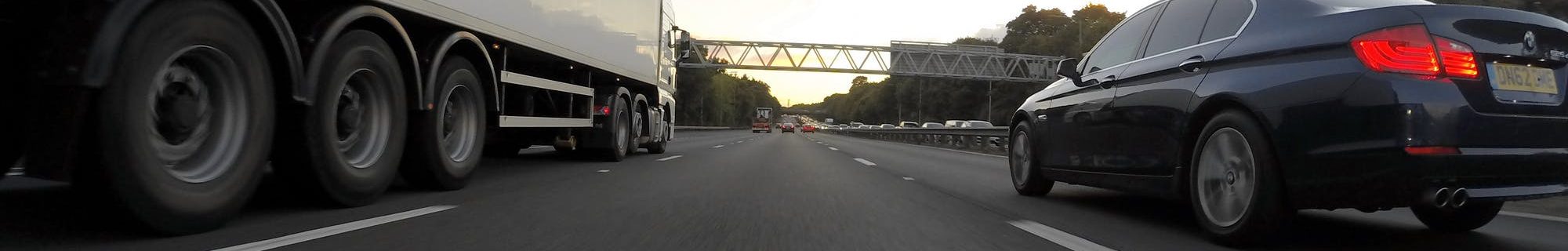 Semi truck Driving on highway Liberty Moves Moving Company
